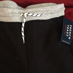 Boys 10/12 black joggers with drawstring waist.